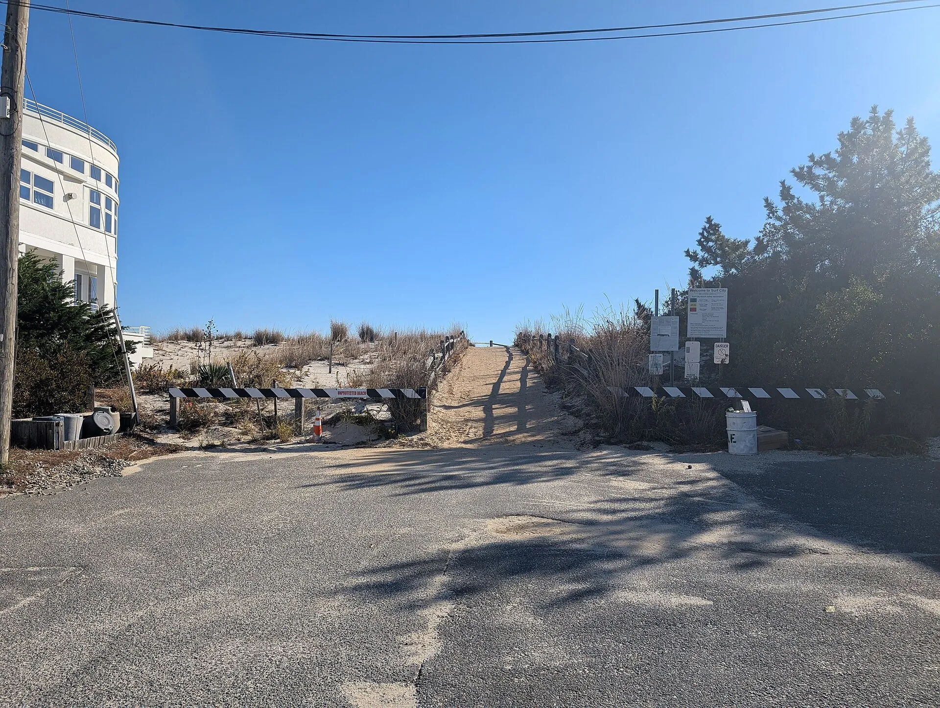 Photo of the entrance to the beach at Division Avenue in Surf City, New Jersey. Photo taken from Division Avenue's eastern terminus looking east-southeast
