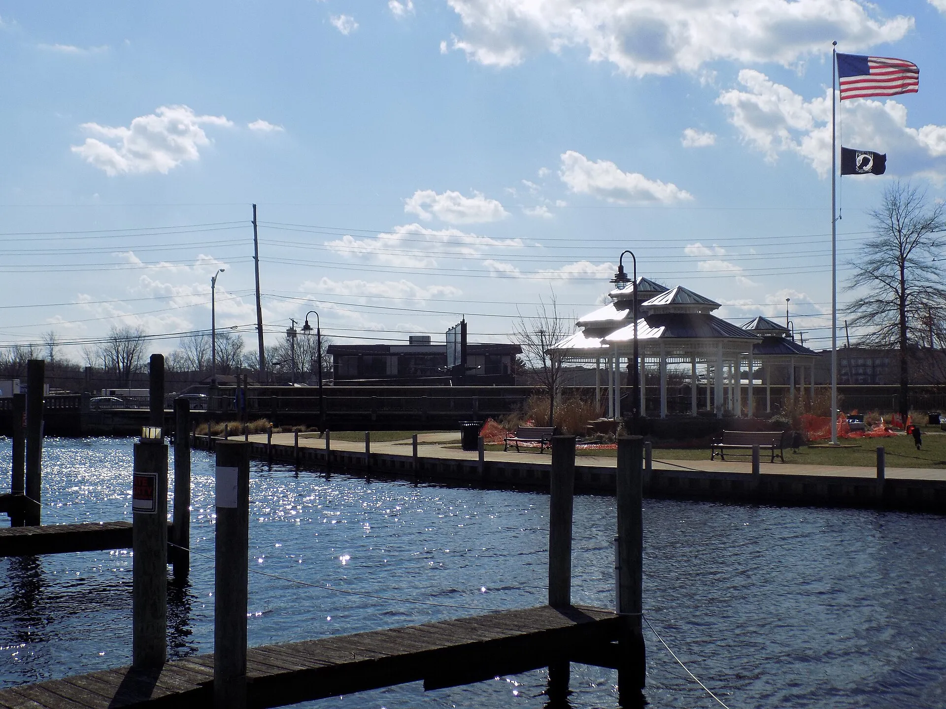 Toms River running through downtown Huddy Park. Boat docks are in the foreground, with the park gazebo in the background (undergoing maintenance)