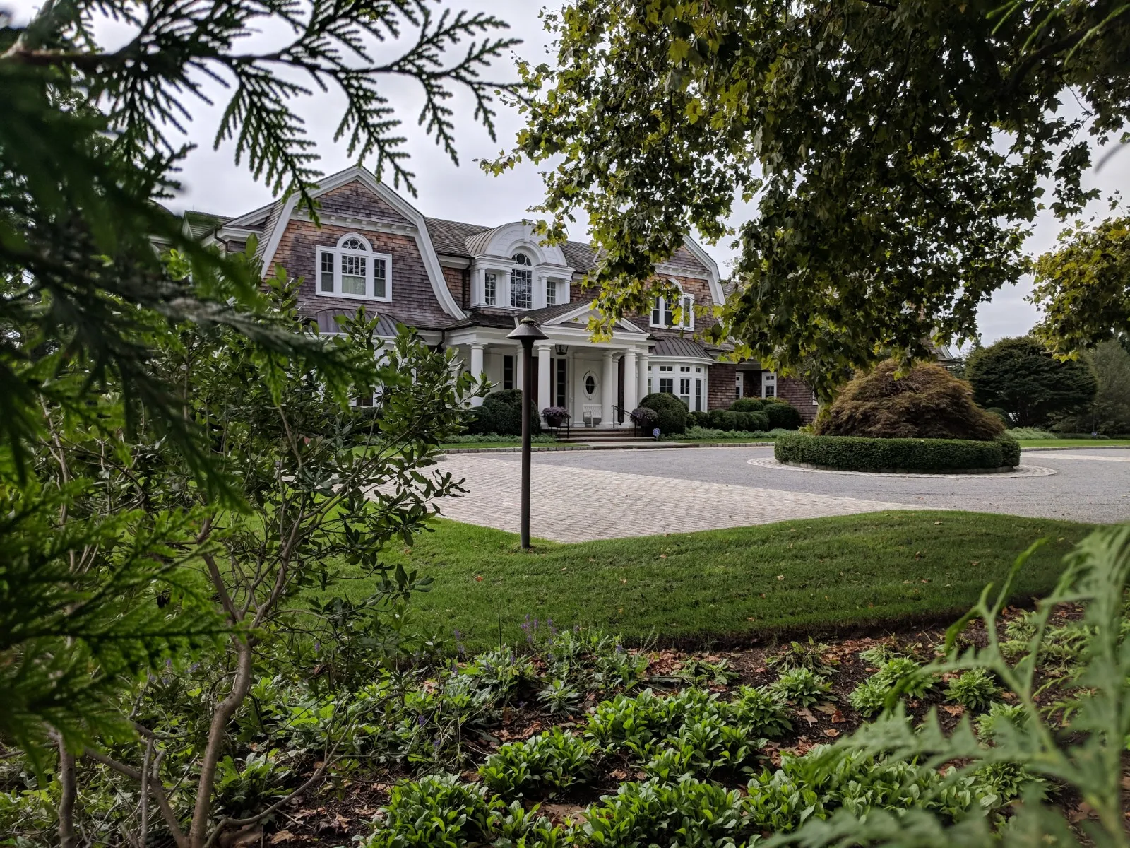 Part of the Hamptons, the summer resort town is close to the ocean and Dune rd is the barrier strip which has picturesque cottages next
