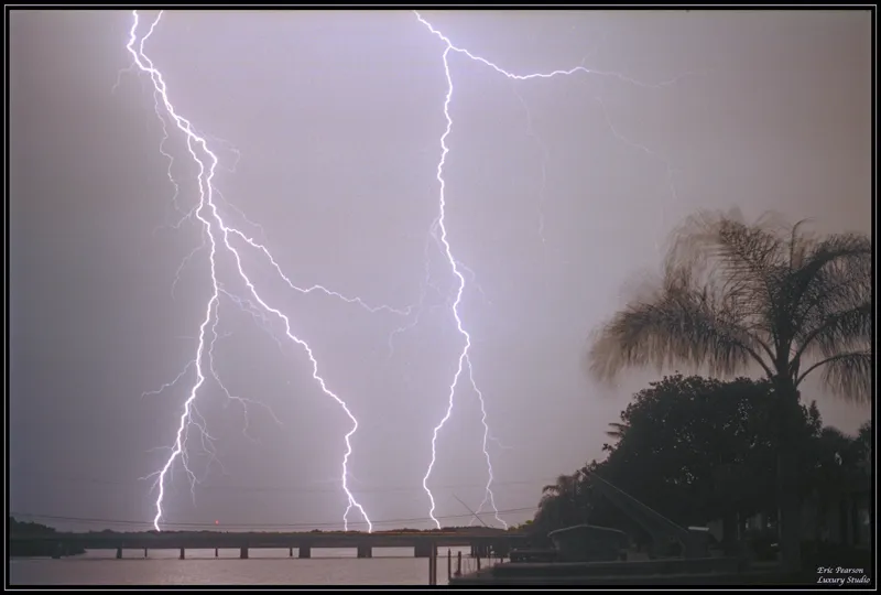 Lightning over a bridge.