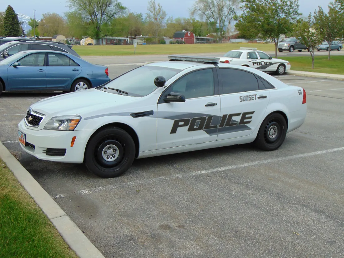 Sunset City Police cars at the Sunset City Offices building in Sunset, Utah, May 2017