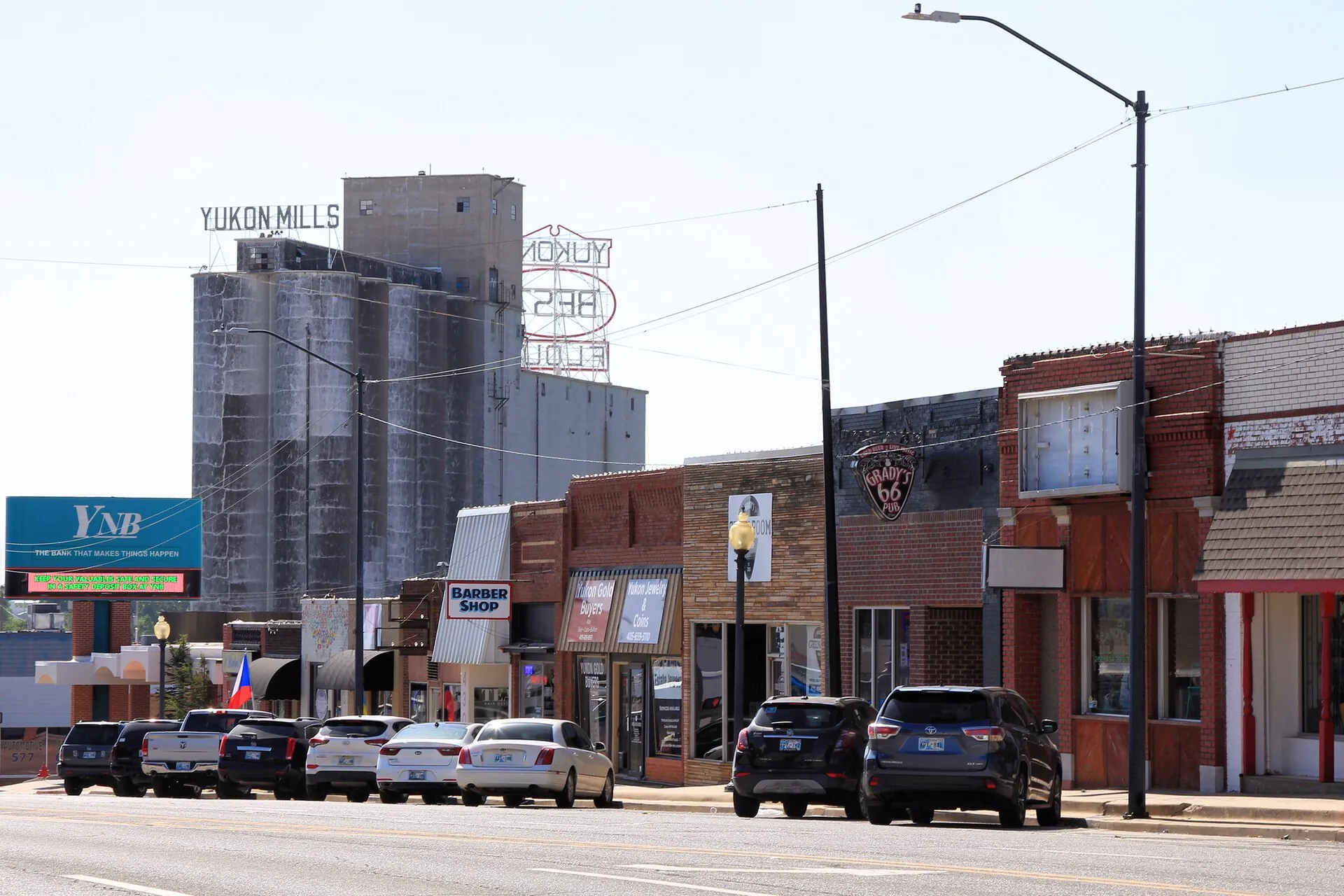 Downtown Yukon, Oklahoma, with the Yukon Mills building and Main Street storefronts, 2022.