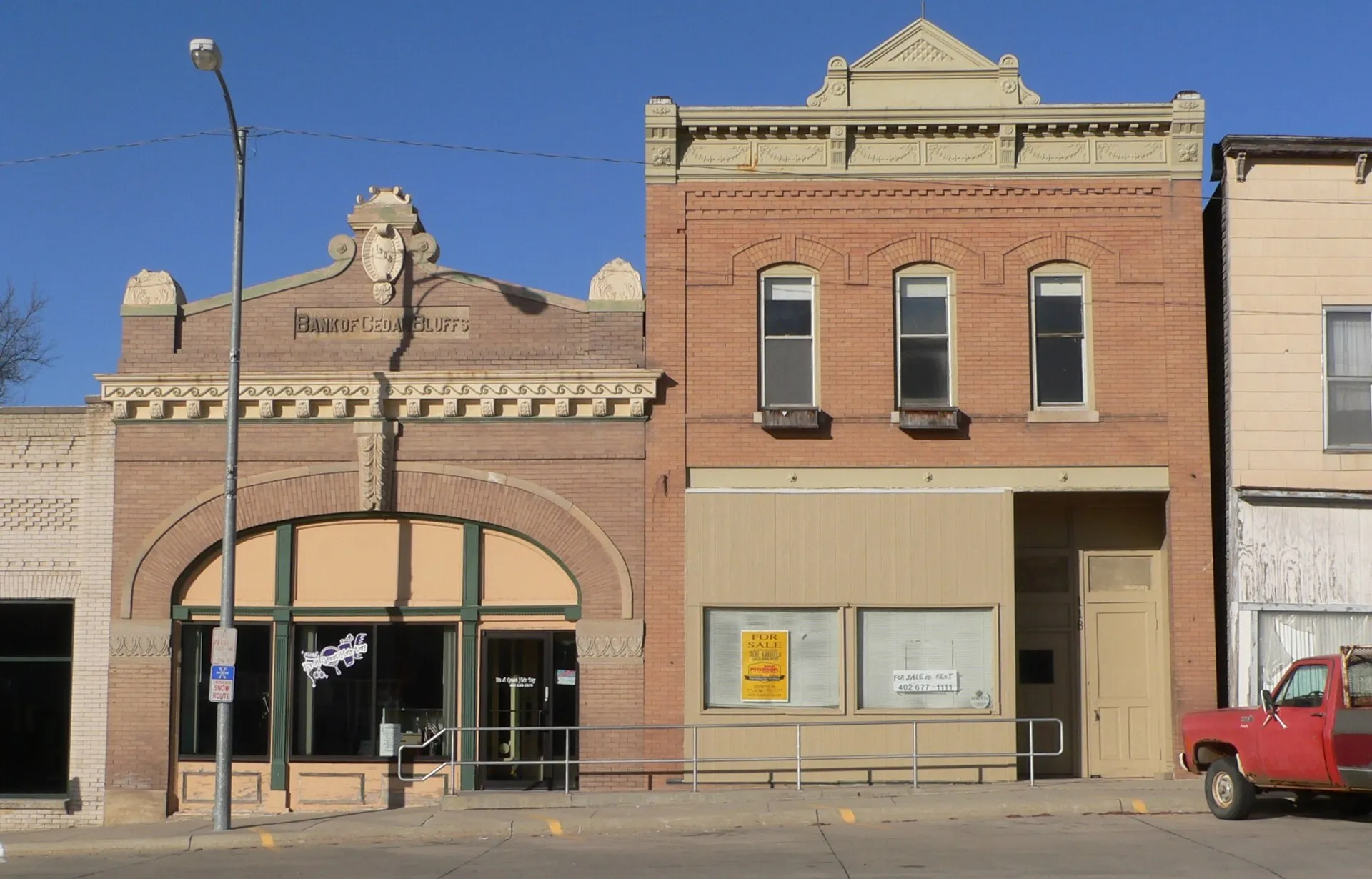 Downtown Cedar Bluffs, Nebraska: buildings at 118 (right) and 120 (left) W. Main Street.