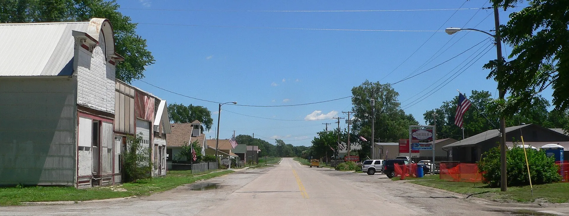 Downtown Cedar Creek, Nebraska: B Street. Camera is facing eastward.
