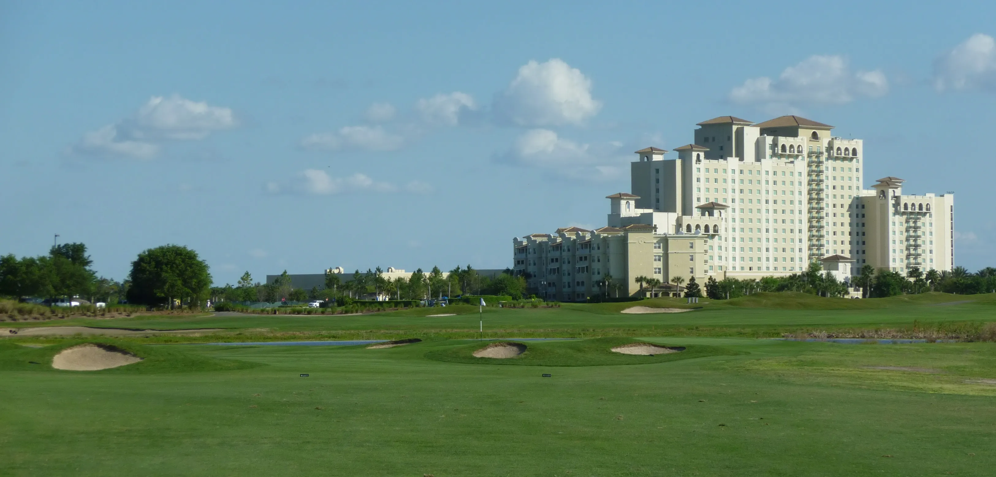 The 18th hole of the ChampionsGate International course and the Omni Orlando Resort