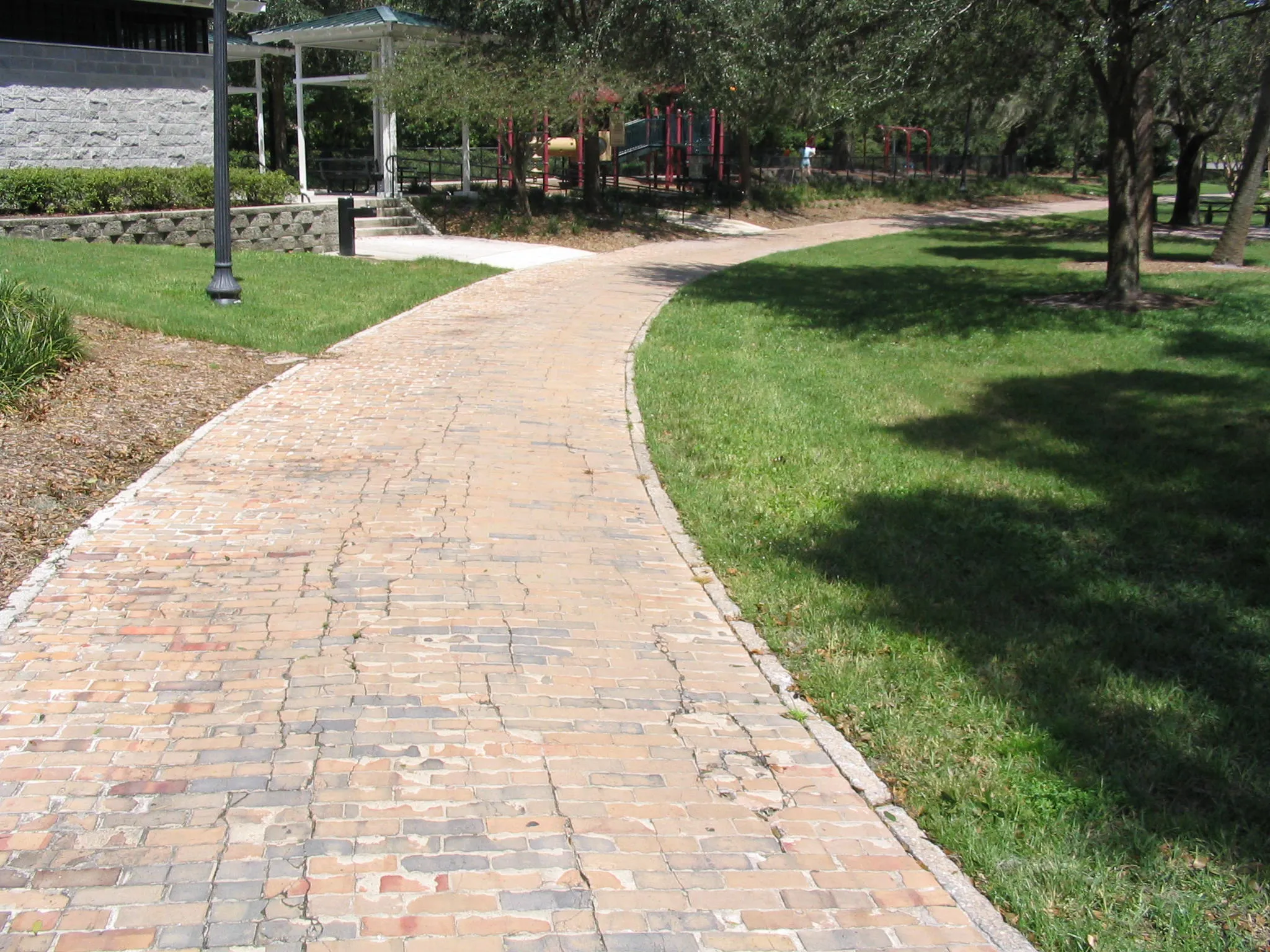 A brick section of the old Dixie Highway on the west side of Lake Lily in Maitland, Florida — built 1915/1916, restored 1999