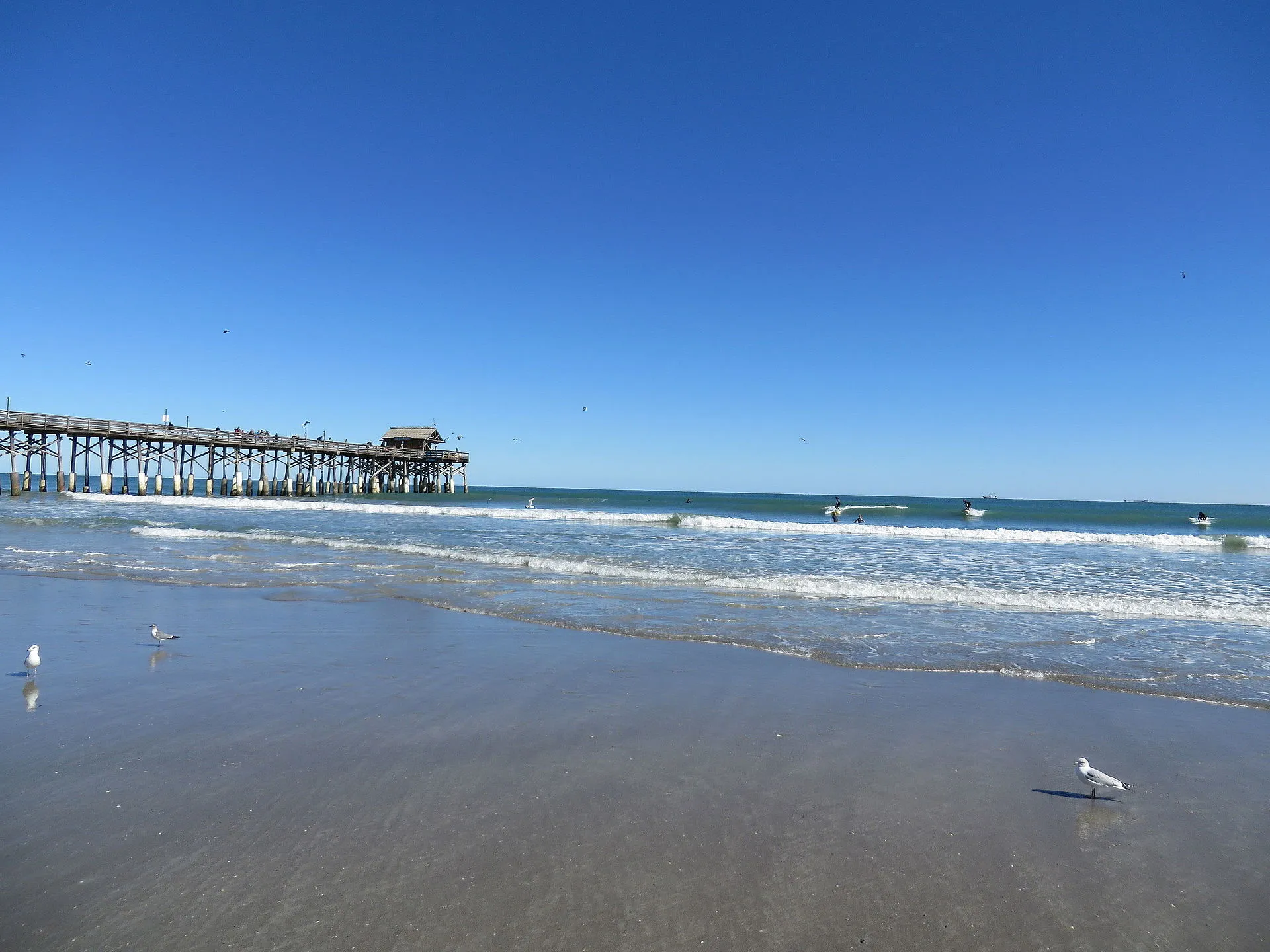 Surfing at the Cocoa Beach Pier, 401 Meade Avenue, Cocoa Beach, Florida.
