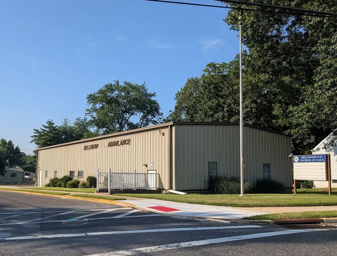 Photo of the Bellmawr Fire Department E.M.S. station in Bellmawr, New Jersey. Photo taken from County Route 659 (West Browning Road) at Lowell Avenue looking south-southwest.
