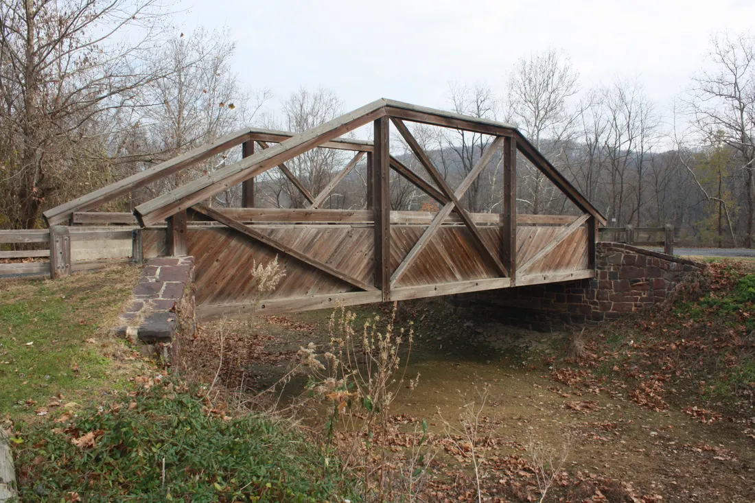 Historic Delaware Canal in Durham Township, Bucks County, Pennsylvania; near Route 212 merging to Route 611. Pedestrian bridge over Delaware Canal to Riegelsville Shore Fishing.