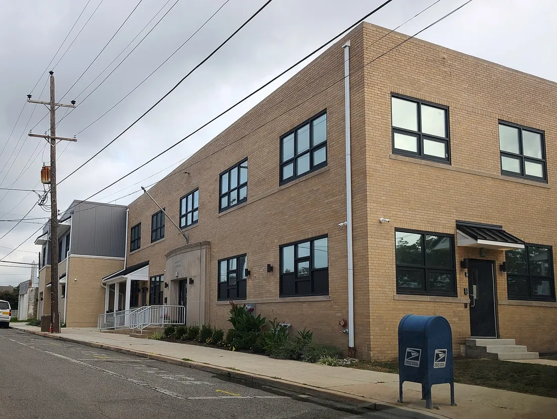 Photo of the Eddystone, Pennsylvania municipal buidling. Photo taken from Saville Avenue at 12th Street looking north.