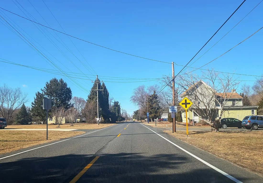 Photo of westbound County Route 610 (Aura Road) entering Elk Township from Clayton, New Jersey. Photo taken looking northwest between Carvin Street / Atlantic Avenue and CR 637 (Fairview Street) / Coyle Road.