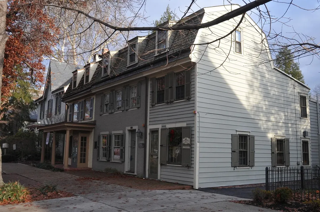 GUARD HOUSES AT 258-260 KINGS HIGHWAY EAST ARE WHERE PERSONS SUSPECTED OF AIDING THE BRITISH WERE HELD UNTIL THEIR TRIAL IN THE INDIAN KING TAVERN ACROSS THE STREET