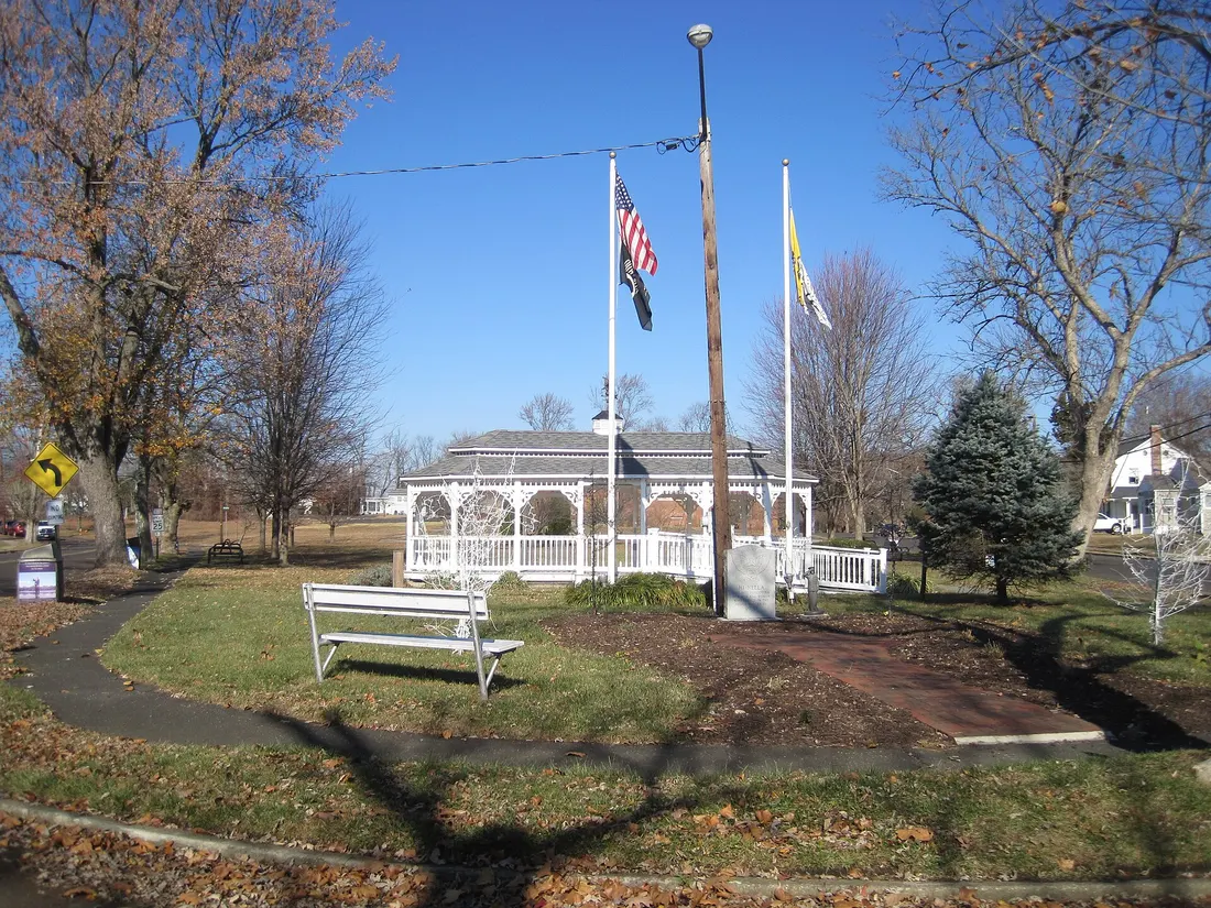 Photo of Earl W. Schilling Memorial Field, a small park in Hi-Nella, New Jersey. The park features a small veterans monument seen in this photo. Photo taken from a slip road between County Route 727 (Minnetonka Road) and
