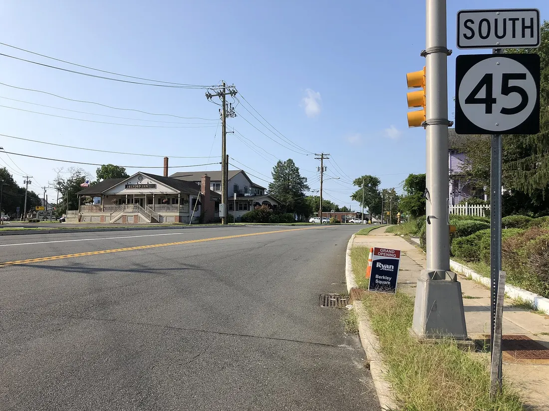View south along New Jersey State Route 45 (Bridgeton Pike) just south of Gloucester County Route 553 Alternate (Main Street) in Mantua Township, Gloucester County, New Jersey