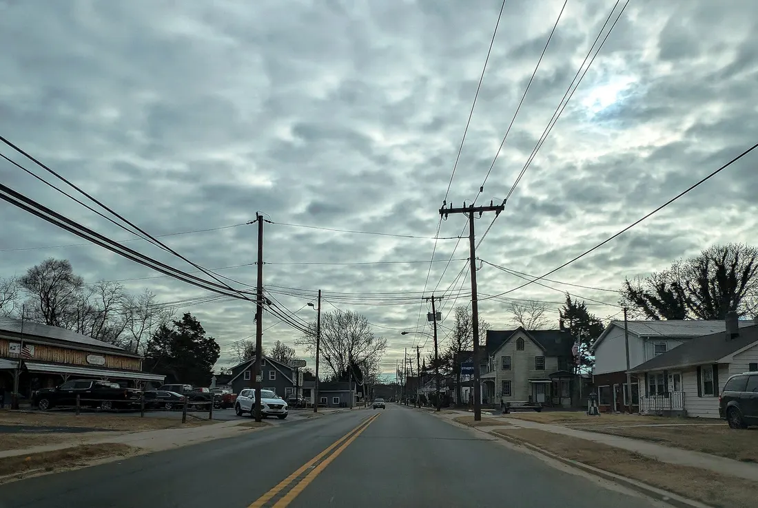 Photo of eastbound New Jersey Route 49 (East Main Street) in the community of Quinton within Quinton Township, New Jersey. Photo taken looking south-southeast between Cottage Avenue and East Avenue.