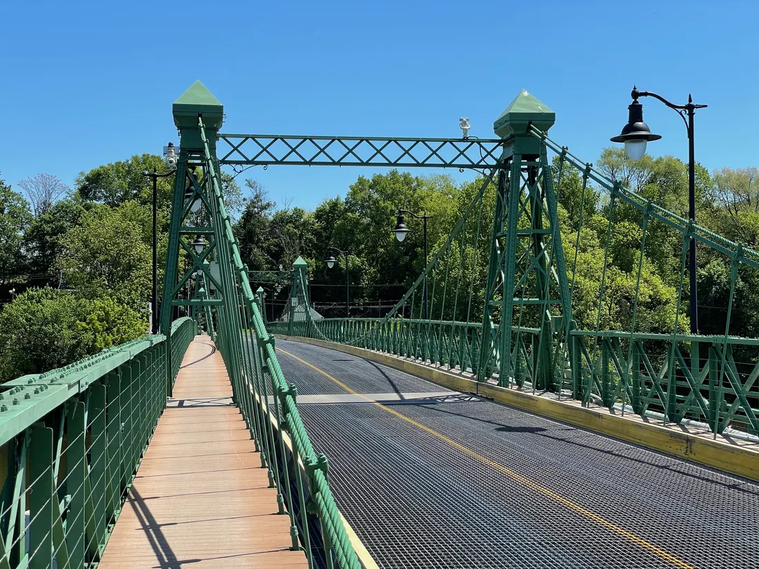 The Riegelsville Bridge, looking east toward Riegelsville, New Jersey from Riegelsville, Pennsylvania. The bridge is listed on the New Jersey Register of Historic Places.