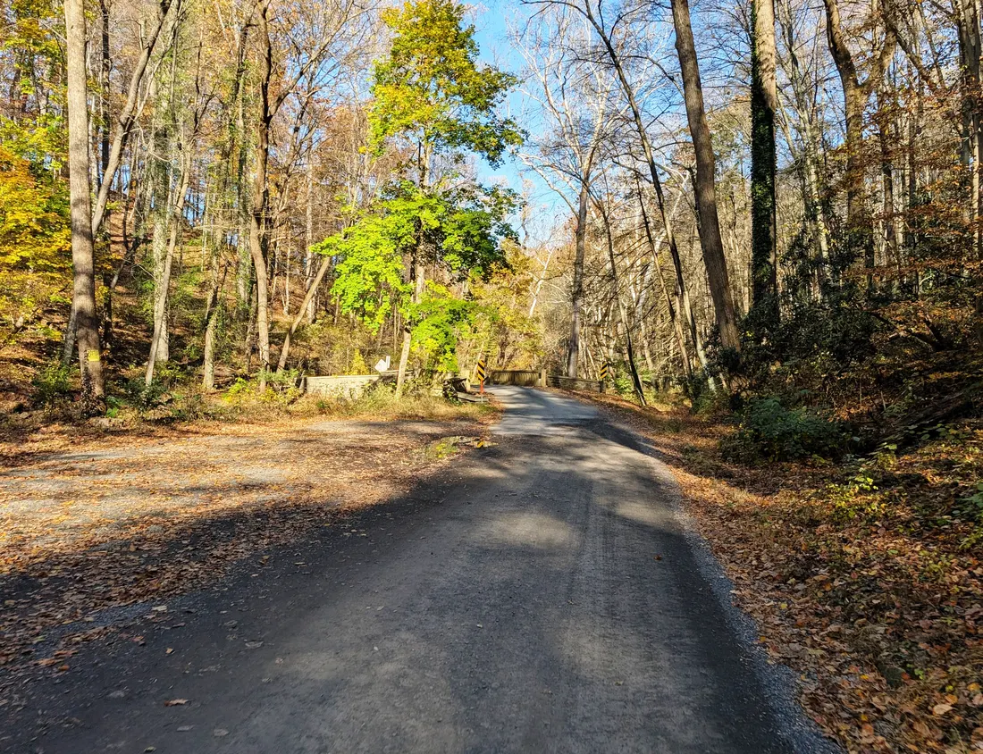 Photo of northbound Cuttalossa Road in Solebury Township, Pennsylvania entering the Cuttalossa Valley Historic District. Photo taken looking northeast approaching a bridge over the Cuttalossa Creek.