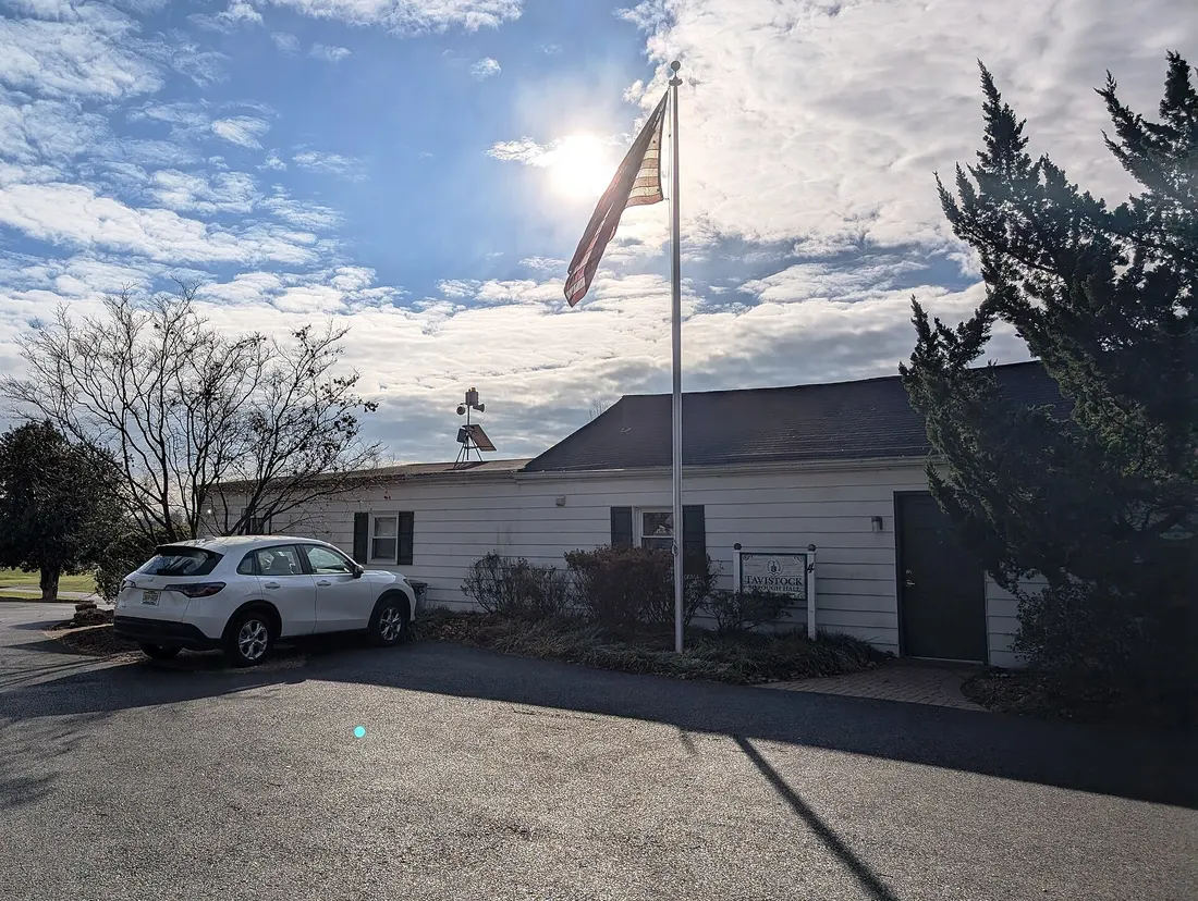 Photo of the Tavistock, New Jersey borough hall. Photo taken from the access road through the Tavistock Country Club looking south.