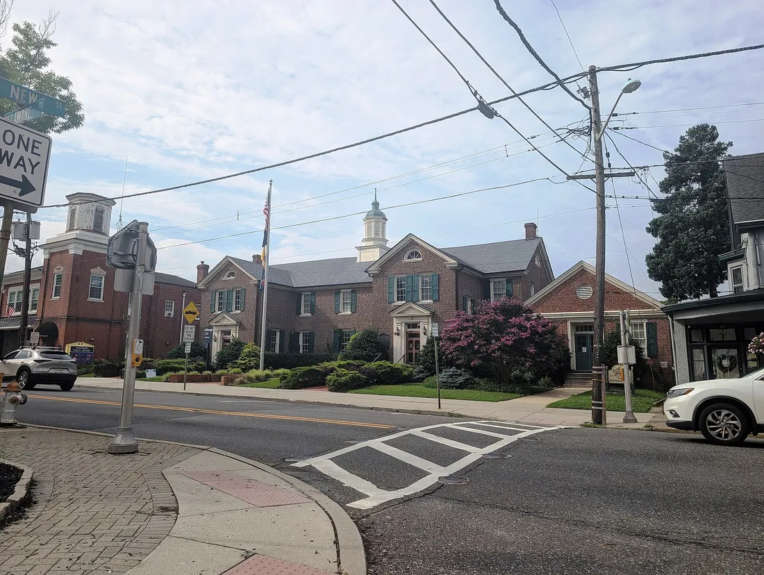 Photo of the Woodbury, New Jersey City Hall. Photo taken from New Street looking south across County Route 640 (Delaware Avenue).