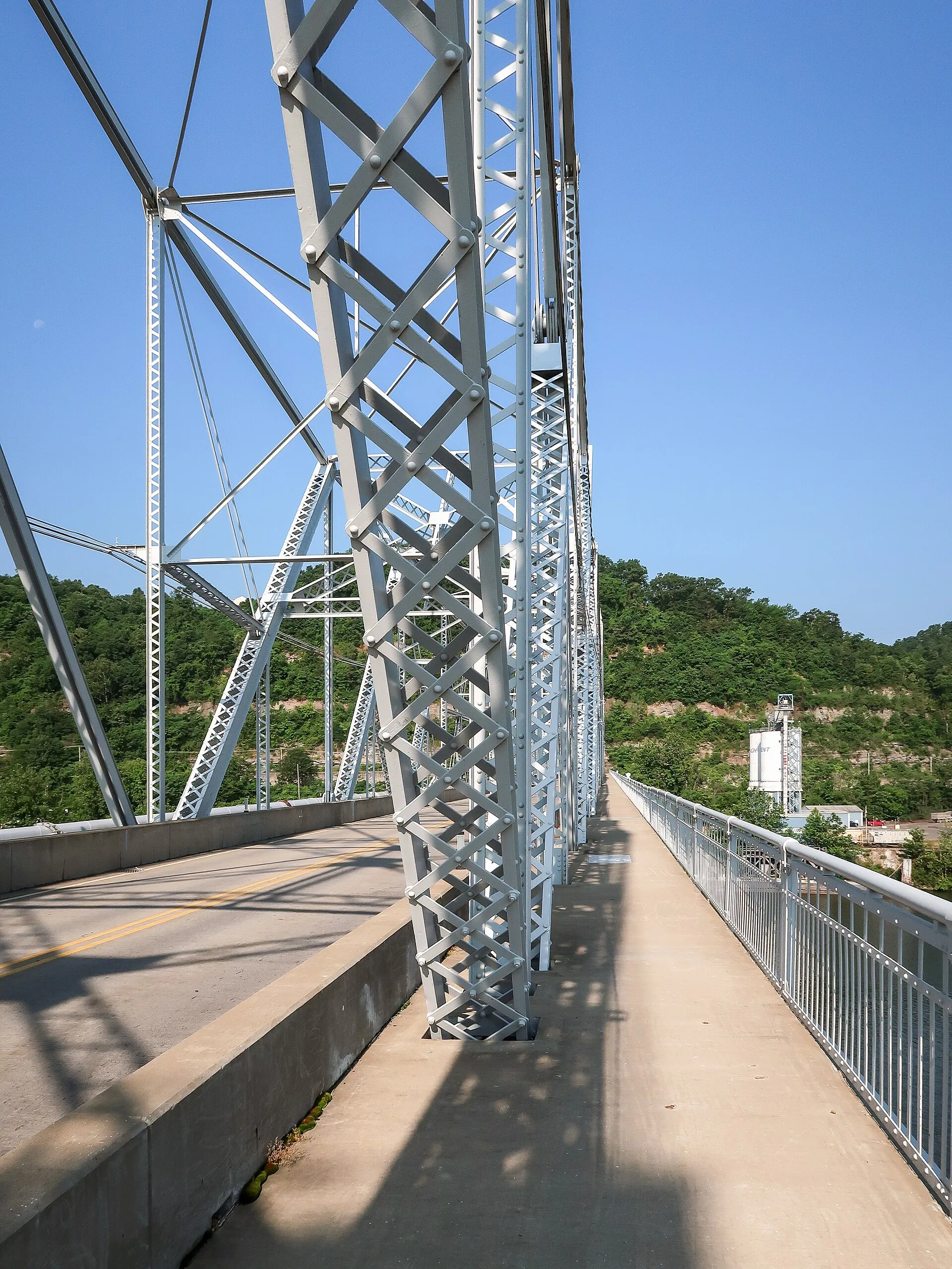 In Ambridge, Pennsylvania, was a view to the west toward Aliquippa, on the sidewalk at the north side of the Ambridge-Aliquippa Bridge, a cantilevered through truss bridge opened in 1927 , built by the American Bridge Company, above the Ohio River.