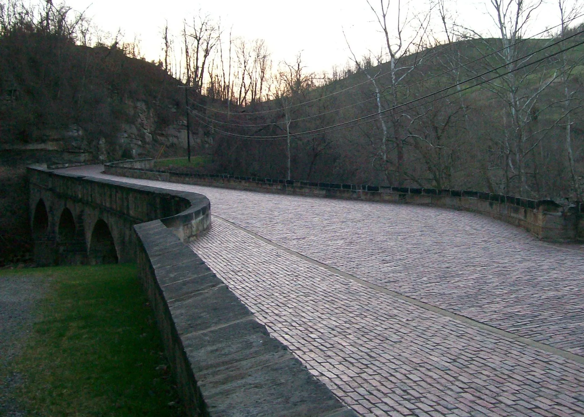 The Blaine Hill S Bridge just outside Blaine, Ohio. The bridge crosses the Wheeling Creek and was built in 1828. The bridge is photographed looking northwest over the bridge. The bridge was listed on the NRHP on March 17, 2010 and was photographed on April 4, 2010.