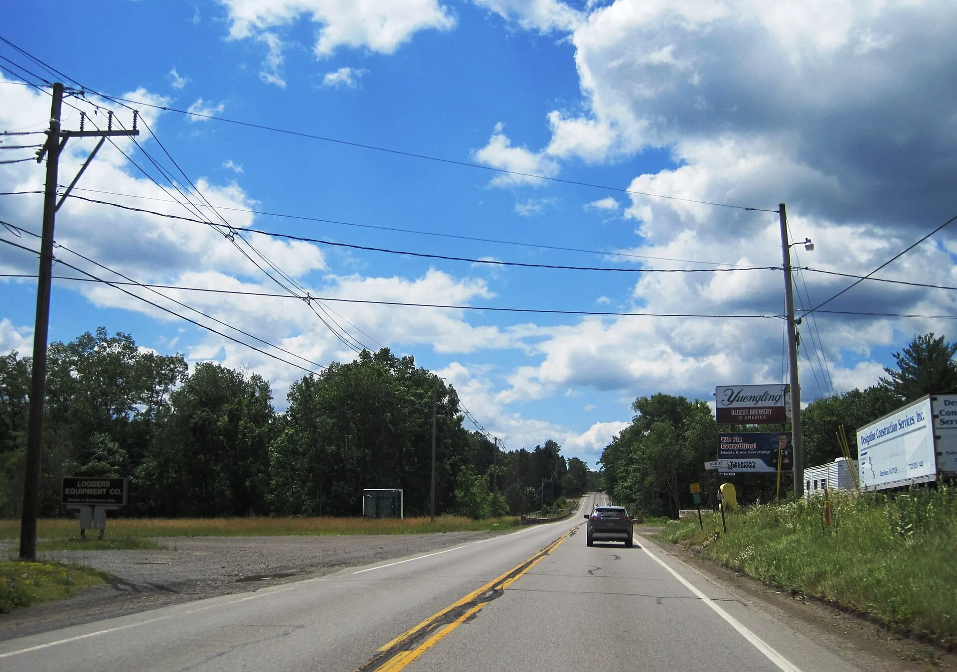 Photo of eastbound U.S. Route 322 (Philipsburg Bigler Highway) entering of Boggs Township within Bradford Township , Clearfield County , Pennsylvania . Photo taken looking south between Baughman Road and Oak Point Drive.