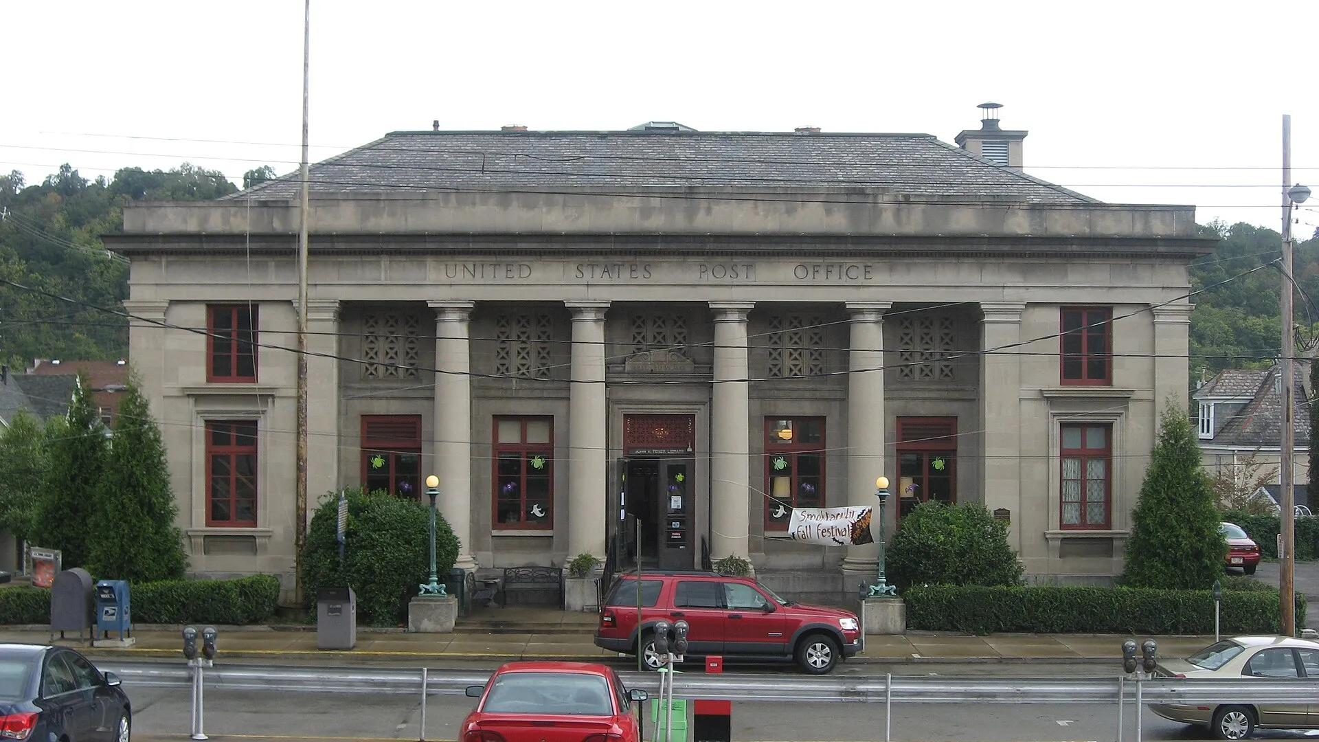 Front of the former post office in Charleroi , Pennsylvania , United States , located at 638 Fallowfield Avenue ( Pennsylvania Route 88 ). Built in 1909 and since converted into a library, it is listed on the National Register of Historic Places , and it is part of a Register-listed historic district , the Charleroi Historic District .