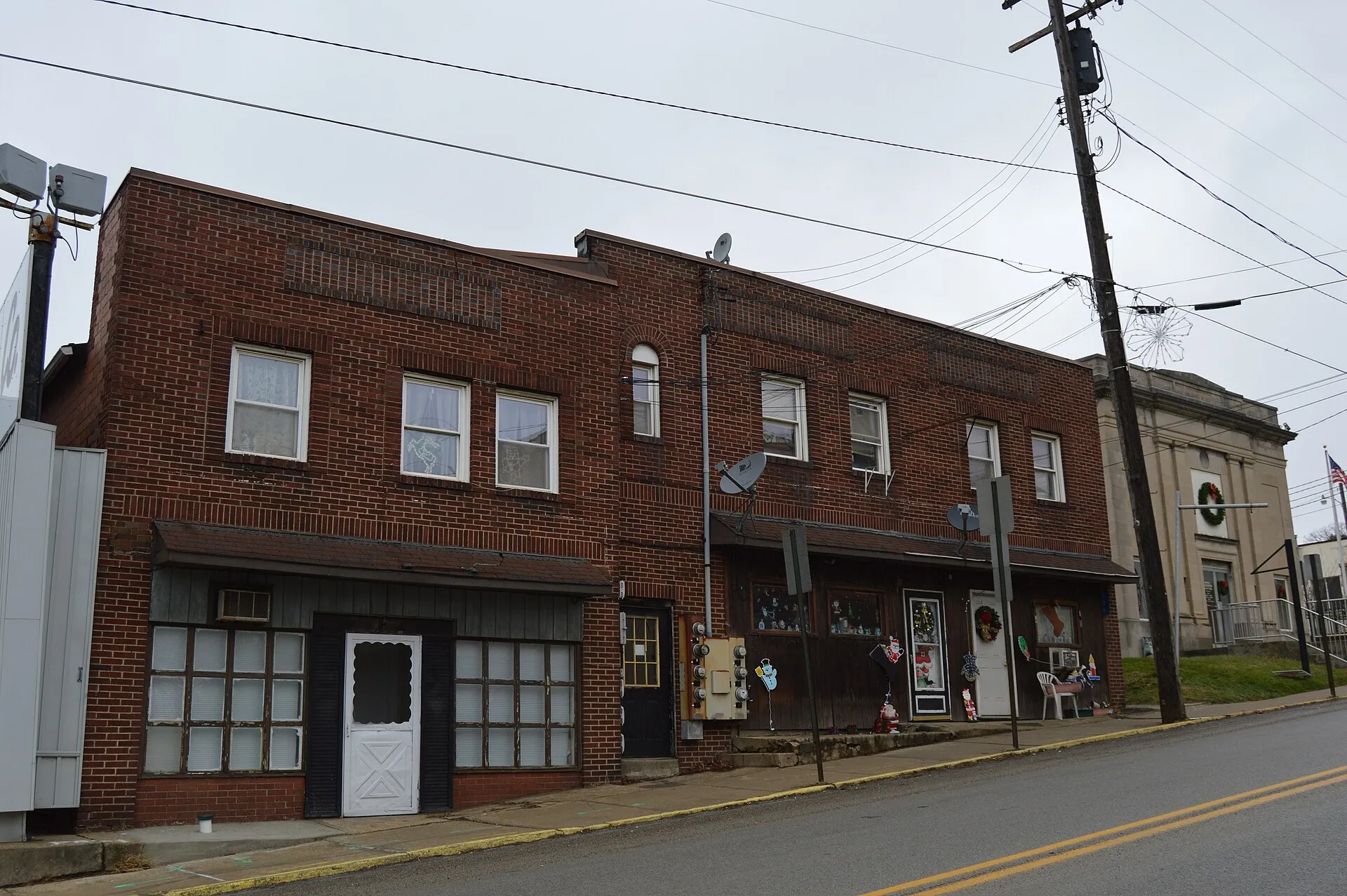 Buildings on the western side of the 100 block of N. Main Street ( Pennsylvania Route 68 ) in Chicora , Pennsylvania , United States .