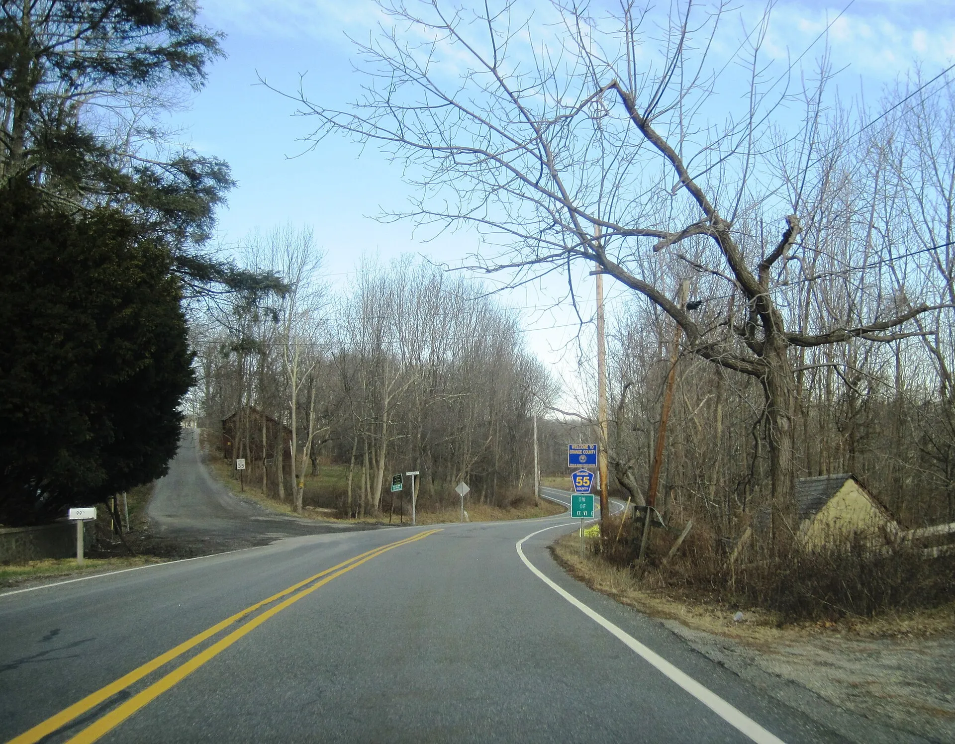 Photo of the northern terminus of County Route 519 (Greenville Road) at the New Jersey – New York line where the road continues as CR 55 (Mountain Road). Photo …