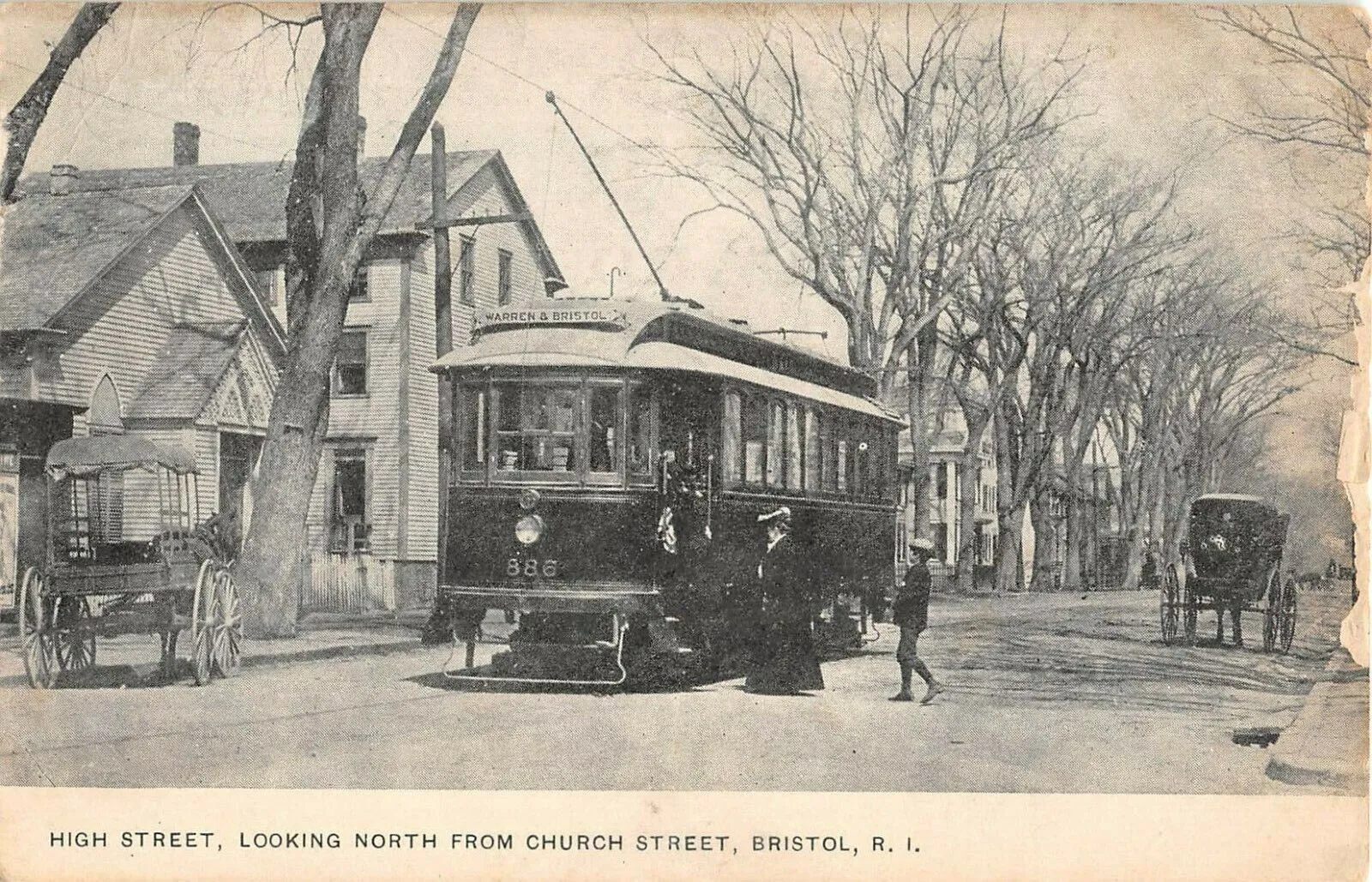 Divided back postcard of a northbound streetcar on High Street at Church Street in Bristol, Rhode Island.