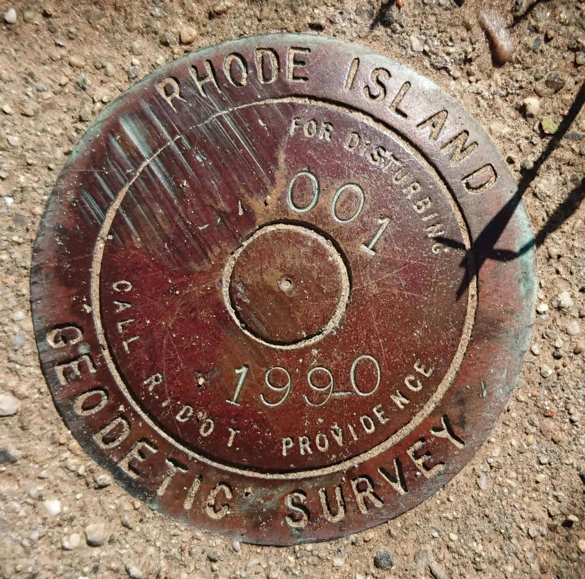 Rhode Island Geodetic Survey benchmark near the Southeast Light, New Shoreham, Rhode Island.
