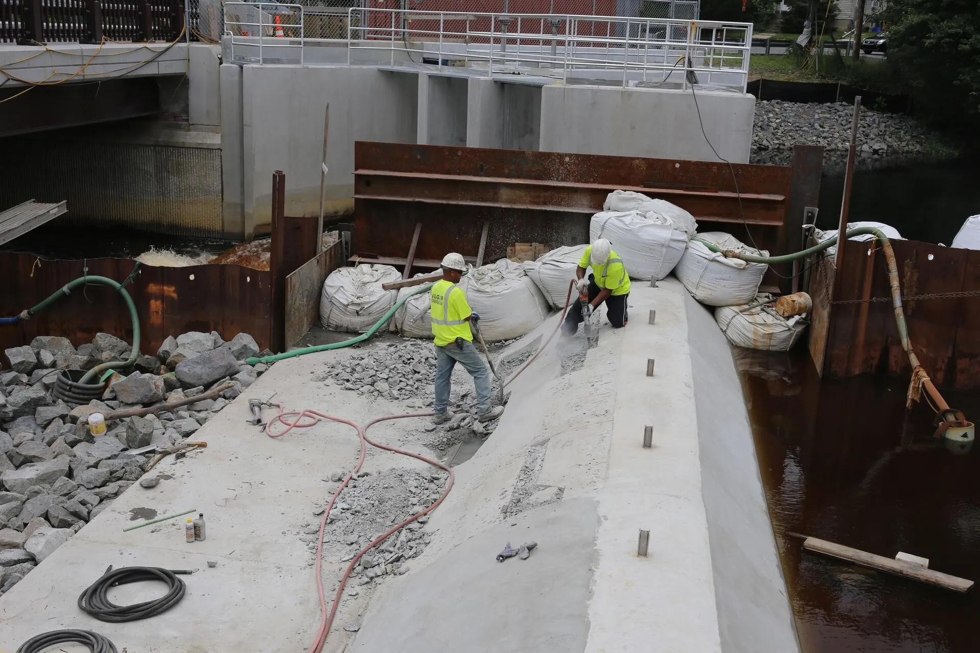 Work proceeds on "Morey's Dam" in Taunton, part of the Bay Street over Mill River Bridge Replacement Project. The project consists of replacing the existing bridge….