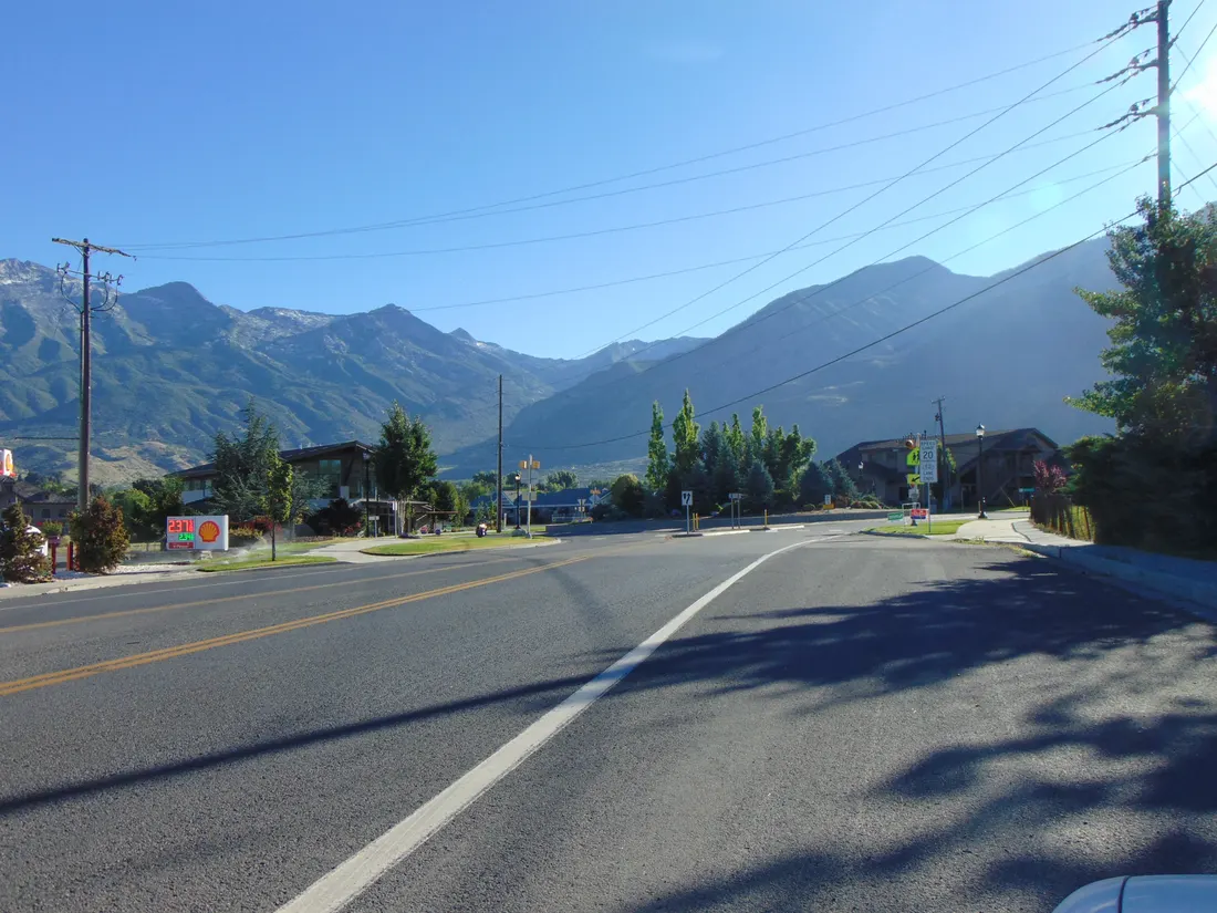 Looking northeast along the Alpine Highway (South Main Street) from the northern terminus of Utah State Route 74 in Alpine, Utah, with Lone Peak (far left) and Box Elder Peak (right) in the background, June 2016L
