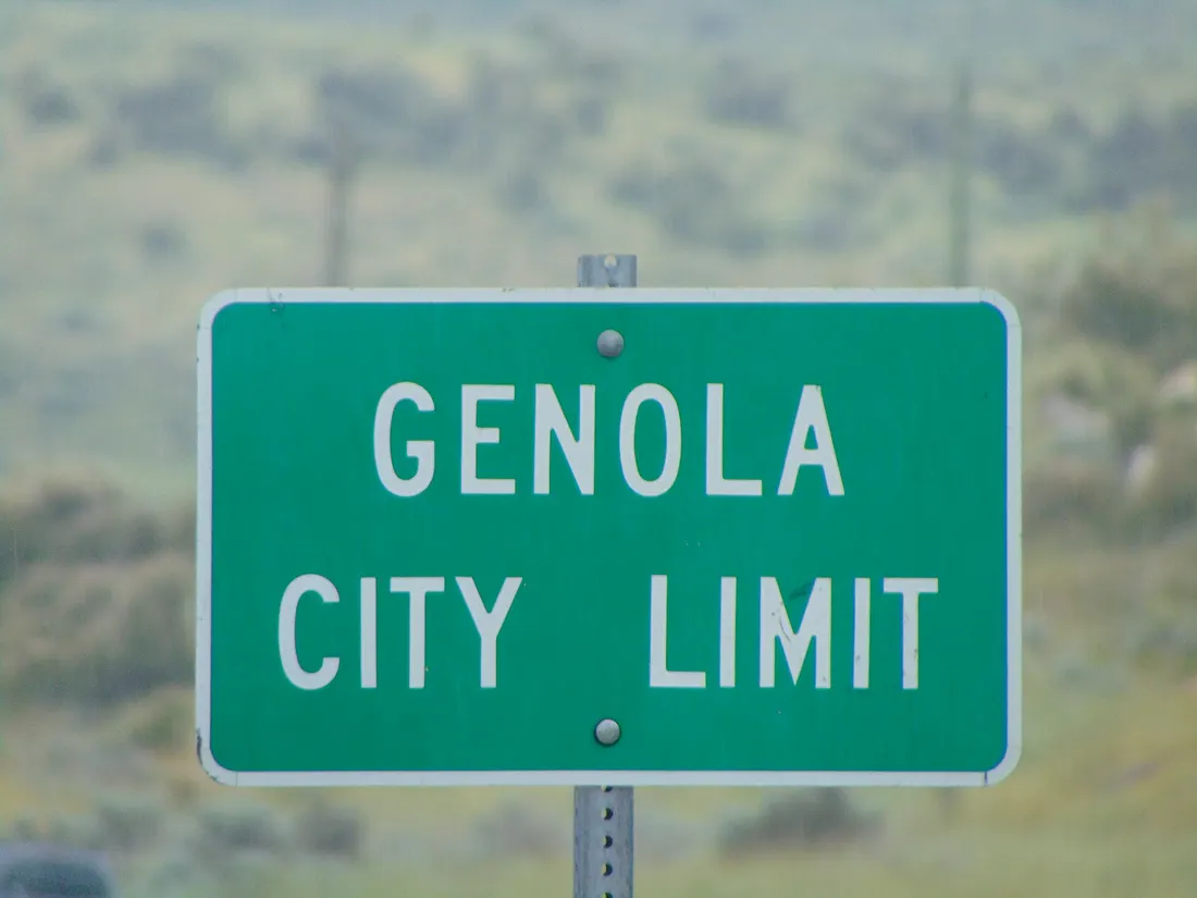 A Genola City Limit sign on southbound Mountain Road (Utah State Route 141) in Genola, Utah, June 2016