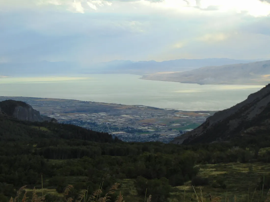 Down at Lindon and Utah Lake in the Utah Valley from Mount Timpanogos in the Uinta-Wasatch-Cache National Forest in Utah County, Utah, with Lake Mountains on the right and the East Tintic Mountains in the distance, August 2017
