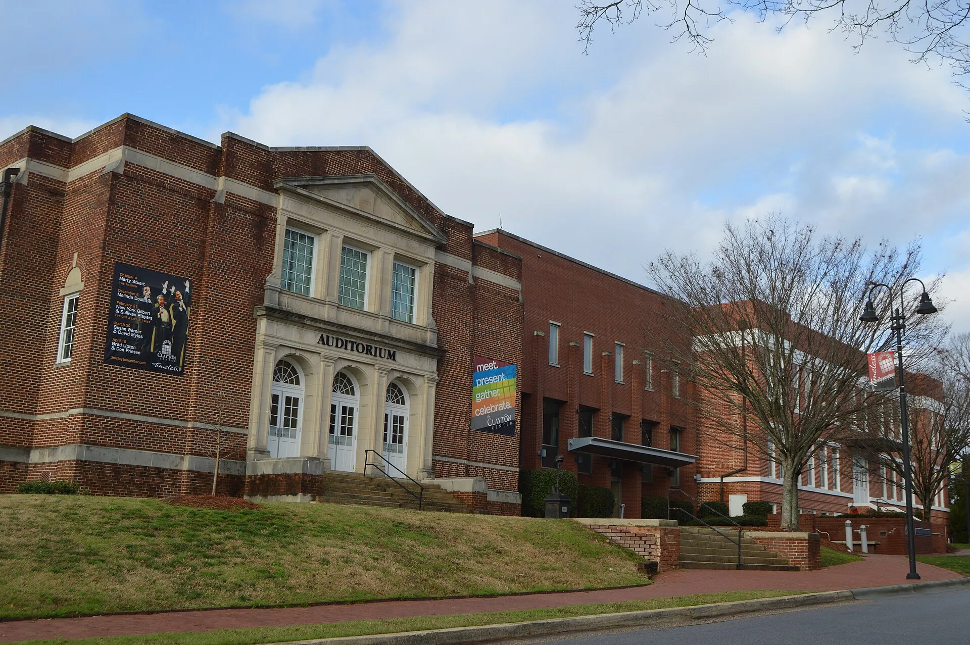 Front of the former Clayton Auditorium and Elementary School, located at 101 and 111 Second Street in Clayton, North Carolina, United States. Built in 1926 and 1915, they are listed together on the National Register of H