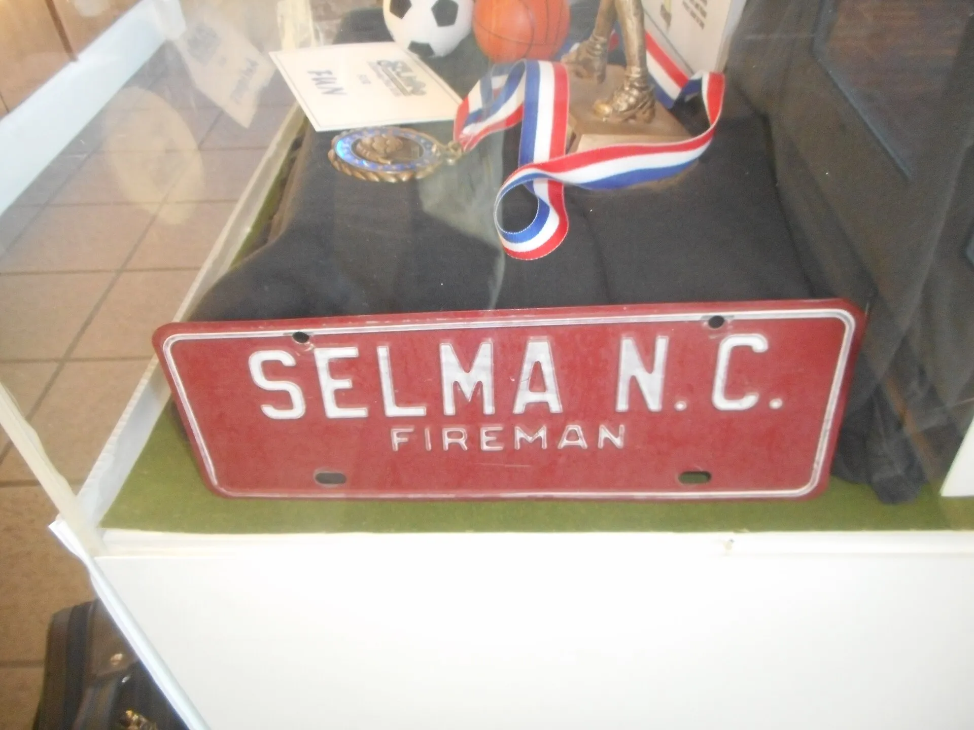 License plate for the Selma, North Carolina Fire Department on display at the main building of the southbound Interstate 95 welcome center in Northampton County, North Carolina.