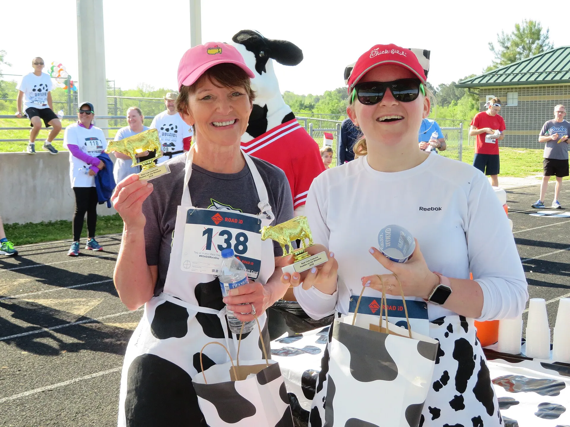 Picture of race participants with Chick-fil-A cows.