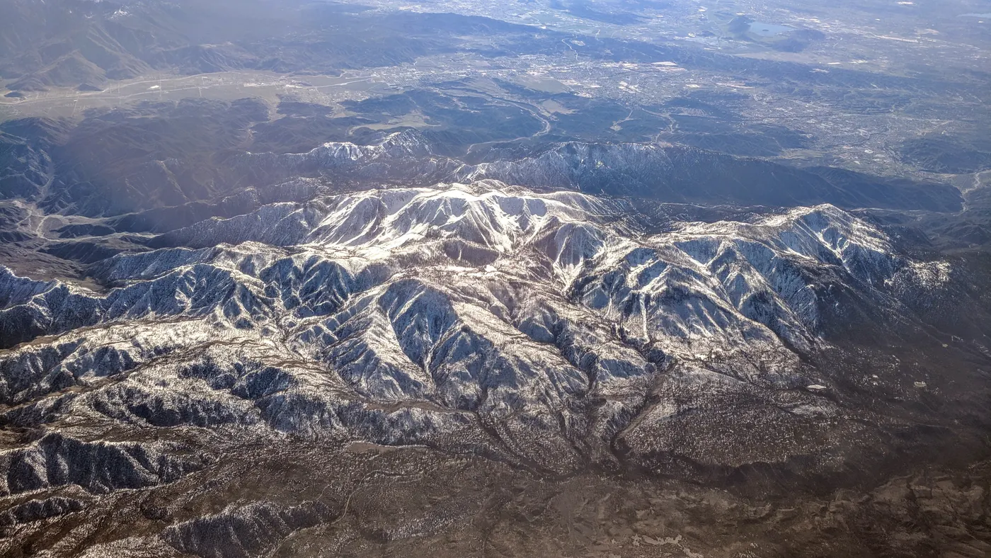 Mount San Gorgonio with snow, Banning Pass and Banning in background, aerial