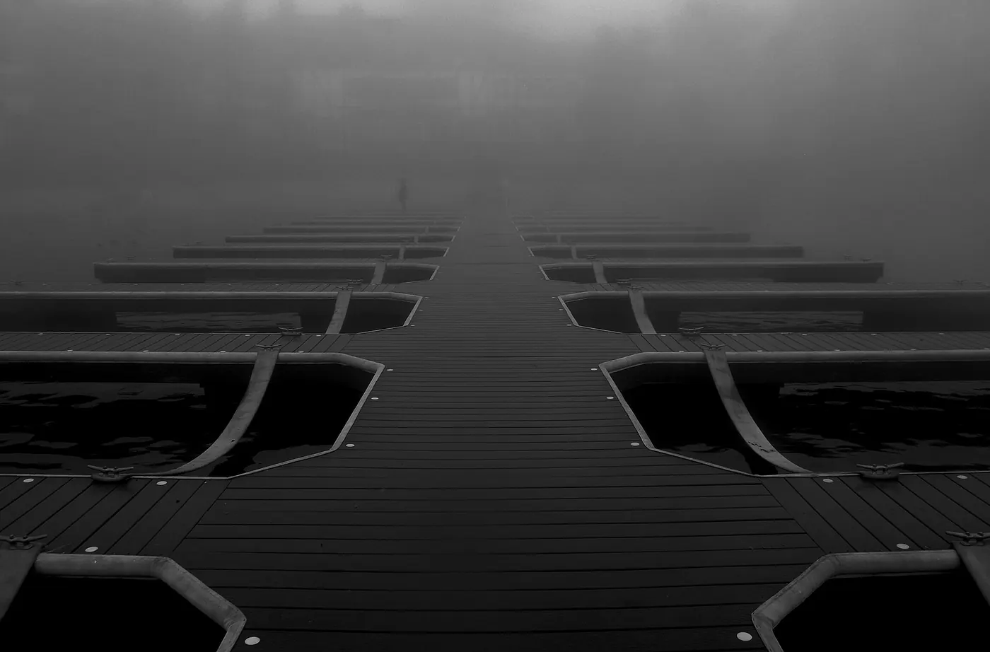 A boat dock vanishing into fog, Lake Arrowhead