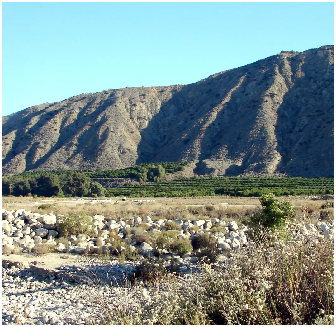 Santa Ana River Wash at the Greenspot Bridge on Garnet Street, Mentone, California, with the San Andreas Fault hills behind