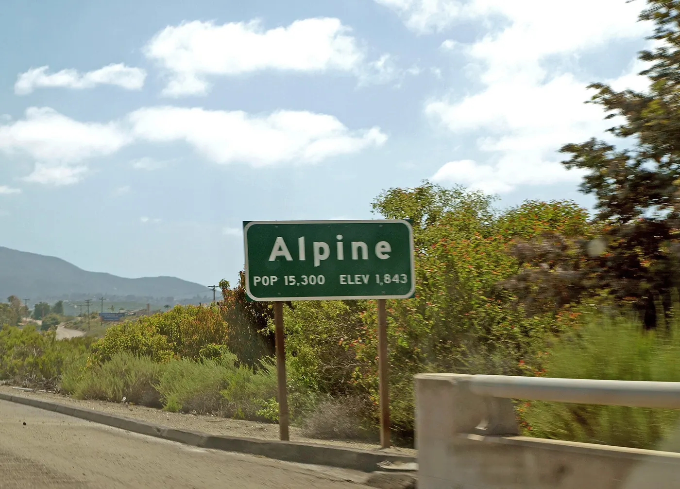 Alpine western town limit sign