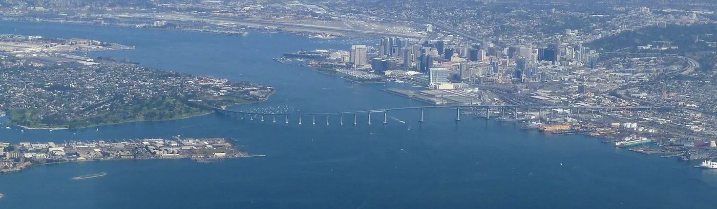 Aerial panorama of San Diego Bay with the Coronado Bridge and Coronado