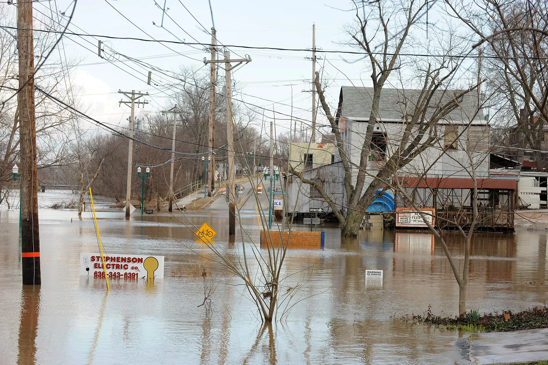 Fenton, MO, March 23, 2008 -- A local business is surrounded by flood water from the local river. Jocelyn Augustino/FEMA
