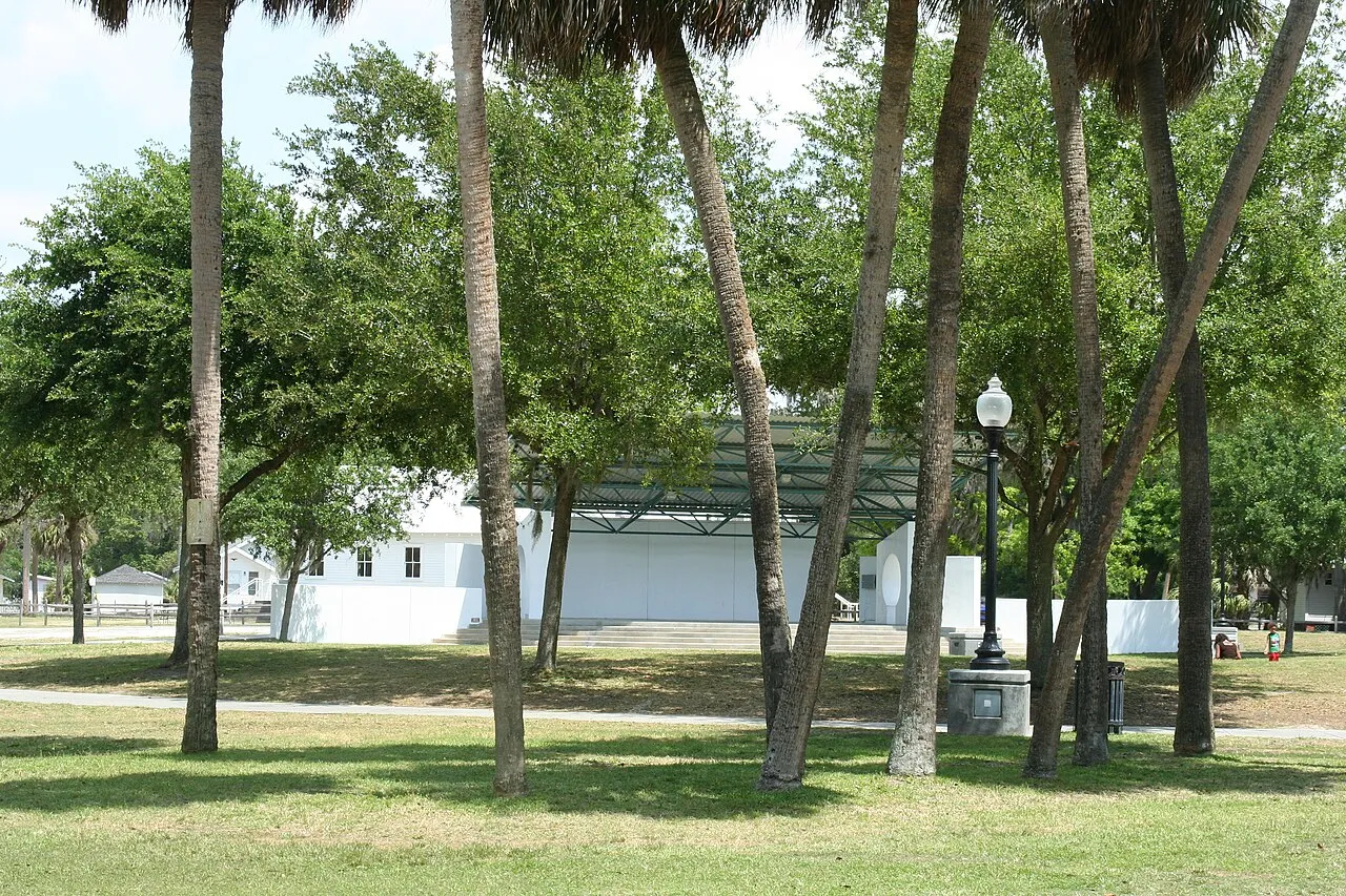 View through palm trees of Sims Park's amphitheatre. April 2012.