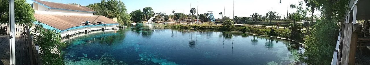 Panoramic picture of Weeki Wachee Springs in Florida. On the left is the Amphitheater built in the 1960s, in the middle is the Bucaneer water park. Below is the mouth of the spring.