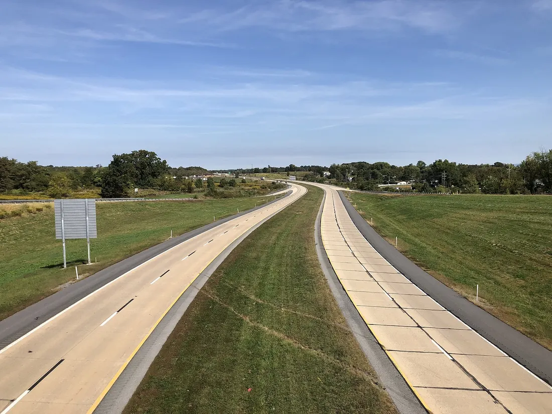 View west along West Virginia State Route 9 from the overpass for West Virginia State Route 115 (Currie Road) in Ranson, Jefferson County, West Virginia