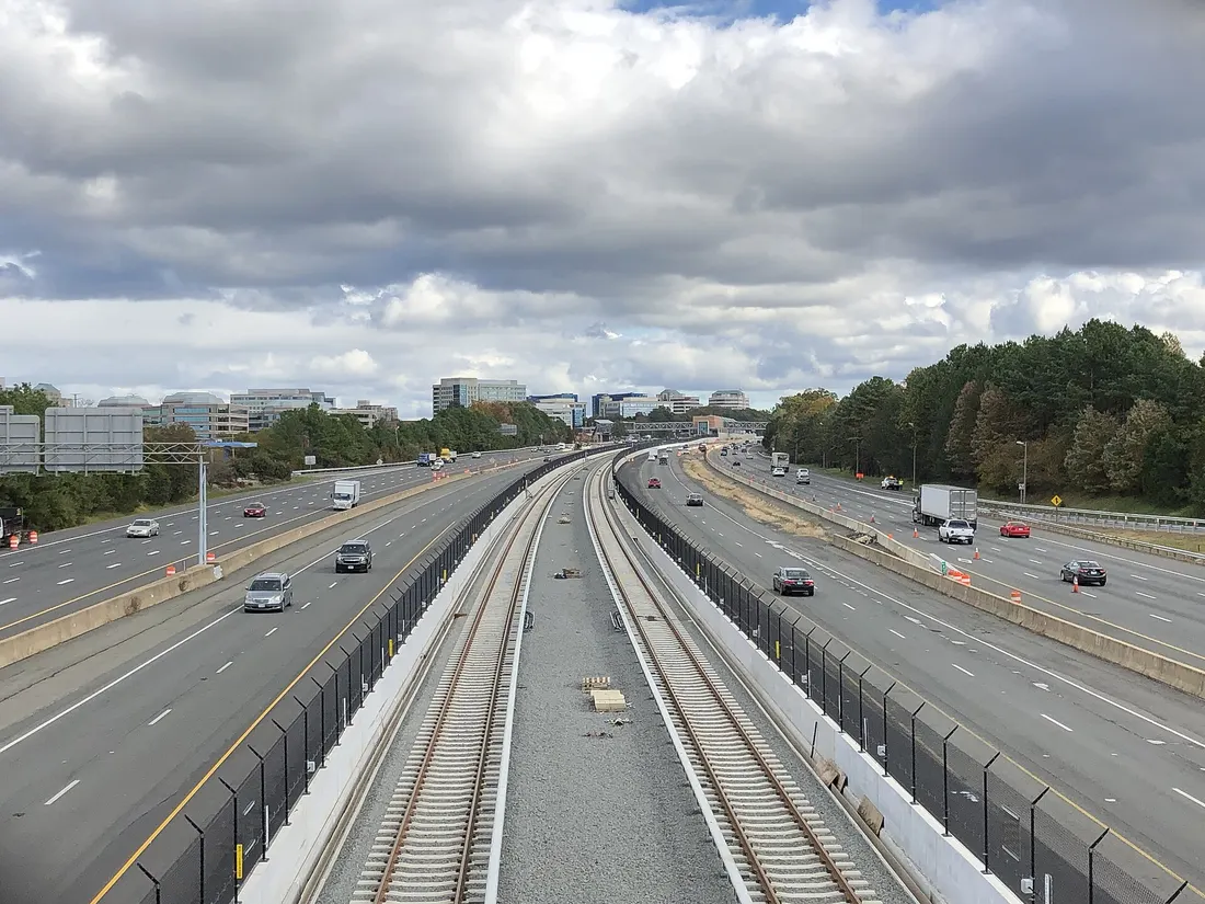 View east along Virginia State Route 267 (Dulles Toll and Access Roads) and the Silver Line of the Washington Metro from the overpass for Virginia State Route 286 (Fairfax County Parkway) in Reston, Fairfax County, Virginia