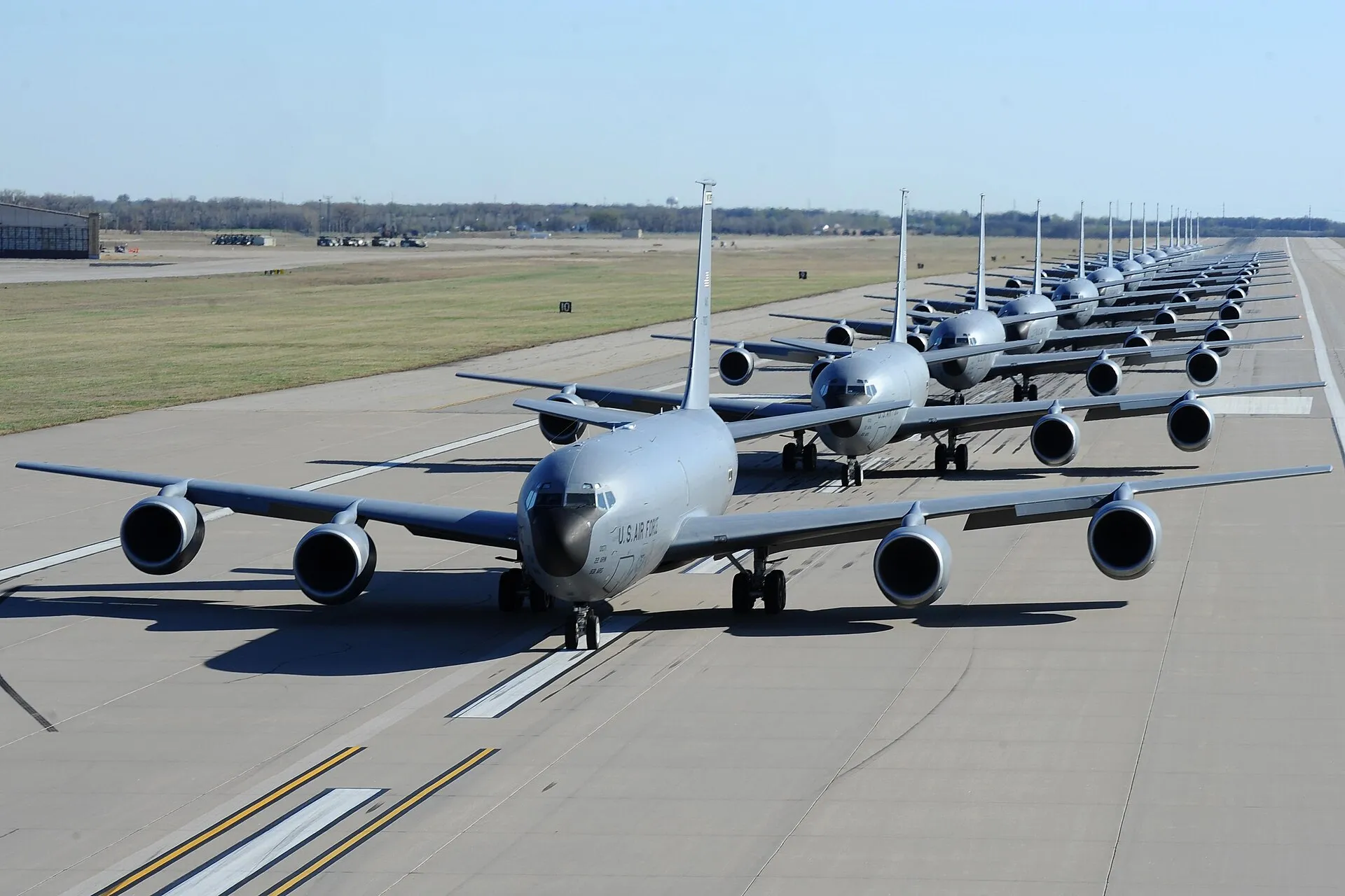 Fourteen KC-135 Stratotankers line up during a simulated alert call March 24, 2016, at McConnell Air Force Base, Kan. Known as the “elephant walk,” the alert call was part of an exercise, which displayed the rapid mobility capabilities and teamwork of the men and women at McConnell AFB to take flight within minutes of being notified of a mission.