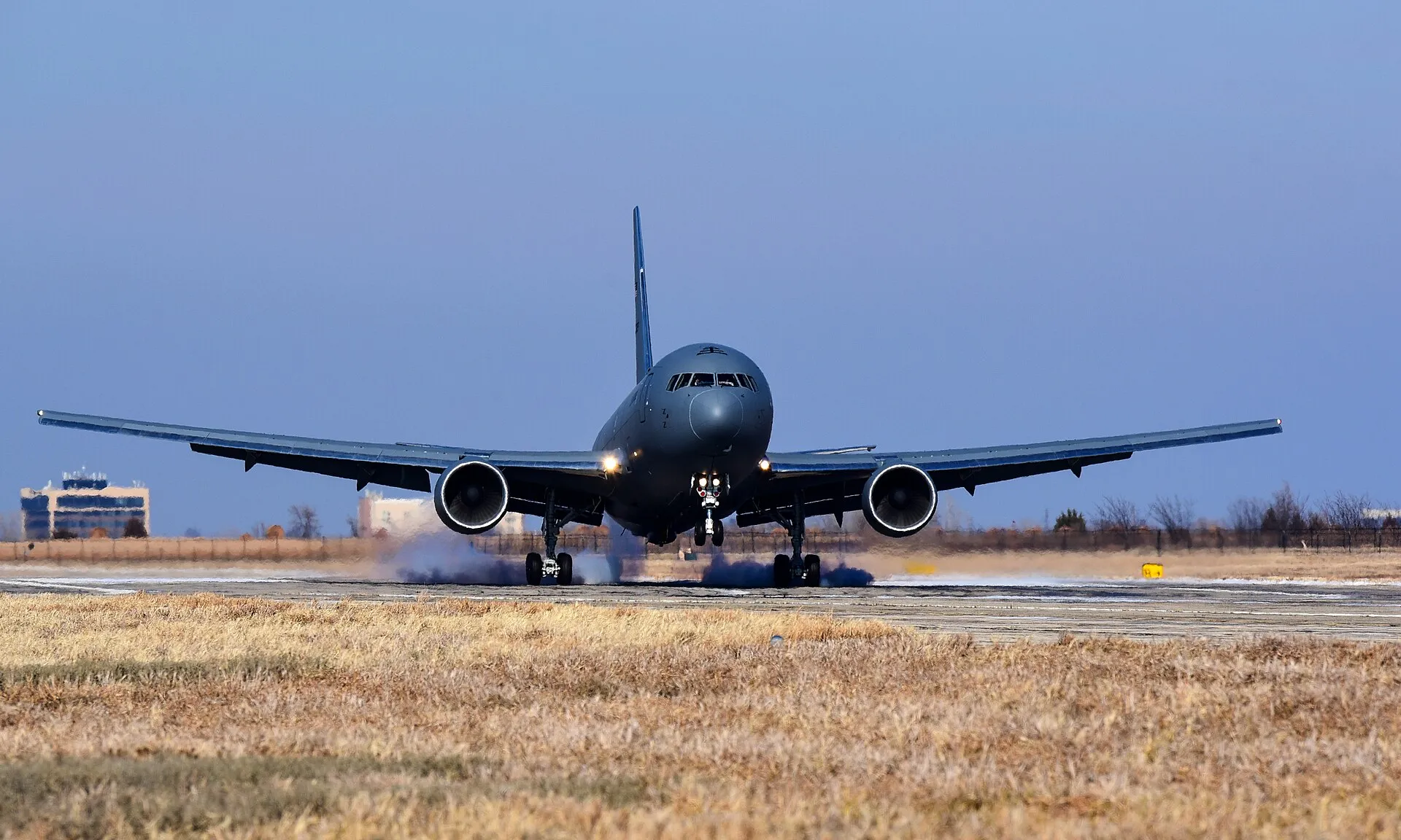 The first KC-46A Pegasus (15-46009) lands on the flightline Jan. 25, 2019, at McConnell Air Force Base, Kansas. The KC-46 will serve alongside the KC-135 Stratotanker at McConnell AFB and supply critical aerial refueling, airlift and aeromedical evacuations at a moment’s notice for America’s military and allies. (U.S. Air Force photo by Airman 1st Class Alan Ricker)